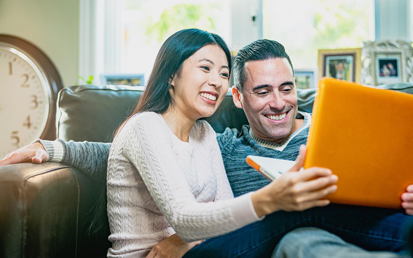 Couple watching laptop